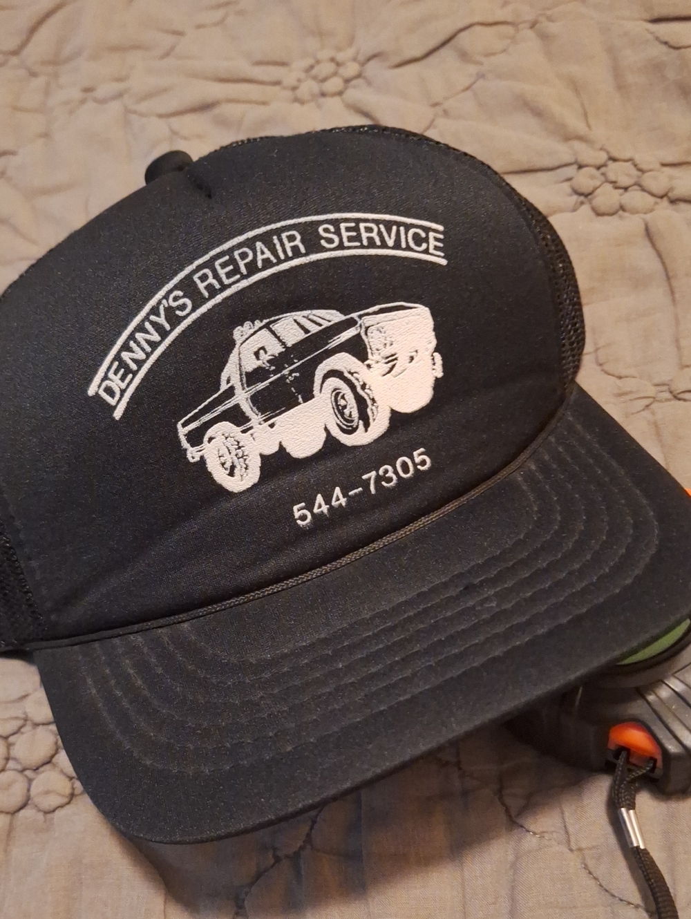 Denny's Repair Service Black Trucker Hat